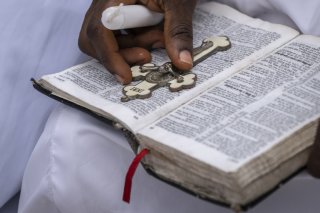 Les Américains ont essayé d'envoyer des bibles vers la Corée du Nord (archives). KEYSTONE/AP/BEN CURTIS